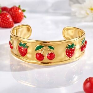 Anthropologie Gold Bracelet with Red and Green Accents